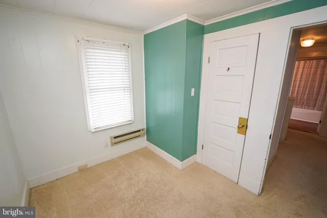 a view of a hallway with closet