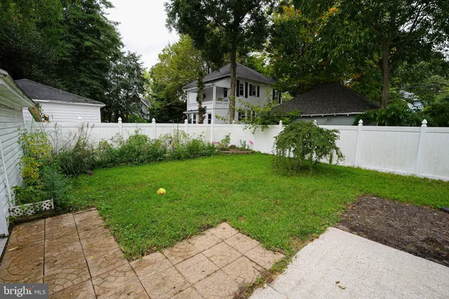 a view of a back yard of the house