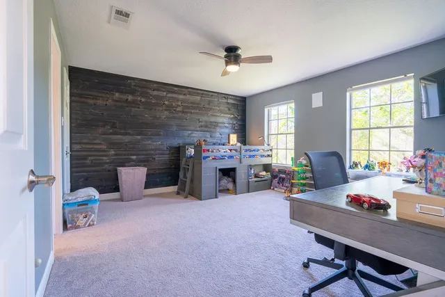 a room with furniture and a fireplace