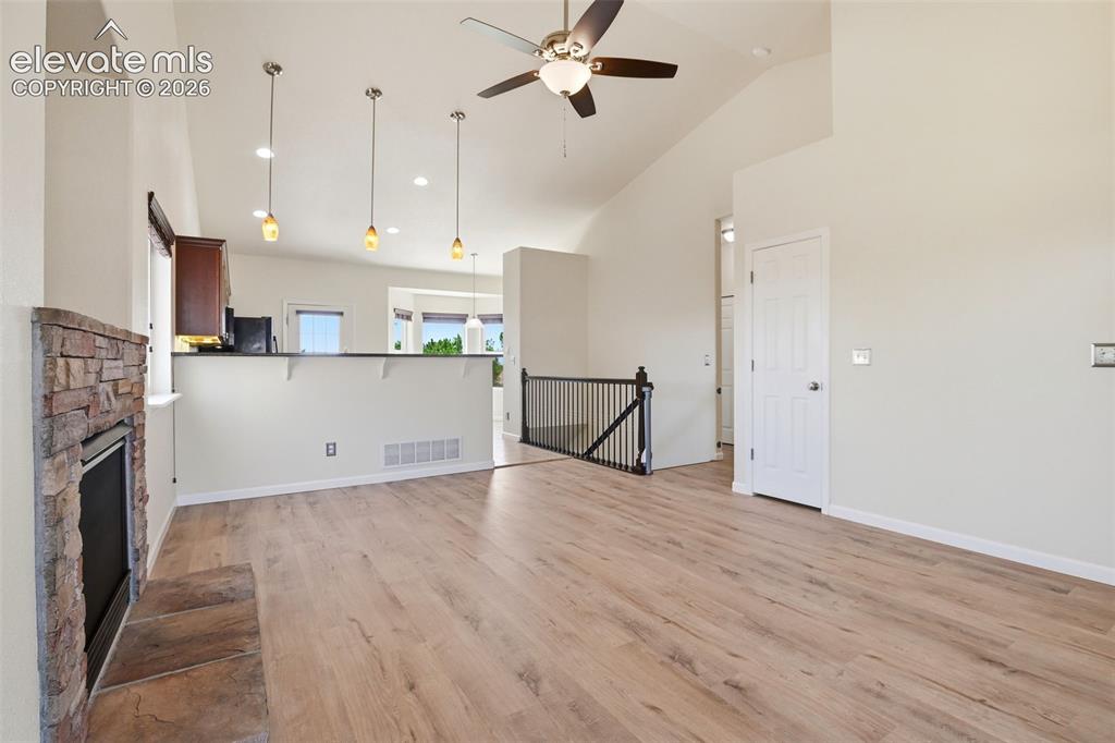 7806 Dutch Loop Colorado Springs, CO 80925 - Photo 6 of 41 a view of a kitchen with a sink and a refrigerator