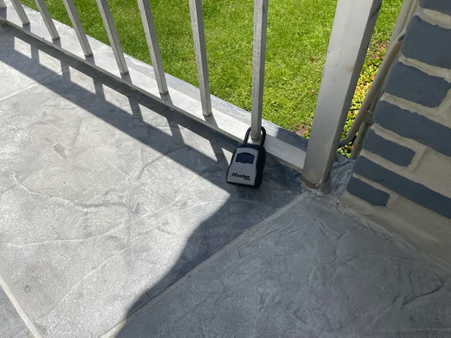 a view of two chairs in balcony