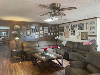 4515 South Bonham Street Amarillo, TX 79110 - Photo 5 of 21 a living room with furniture and a chandelier