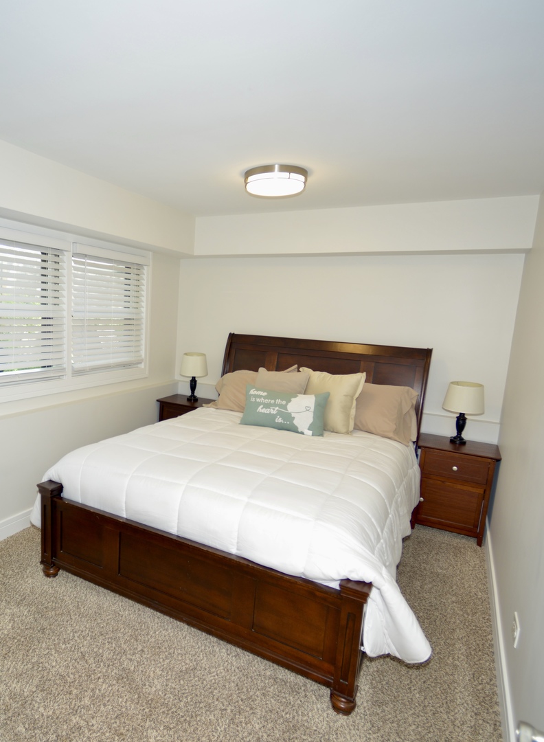 1181 Sherwood Road Highland Park, IL 60035 - Photo 17 of 22 a bedroom with a bed and a night stand