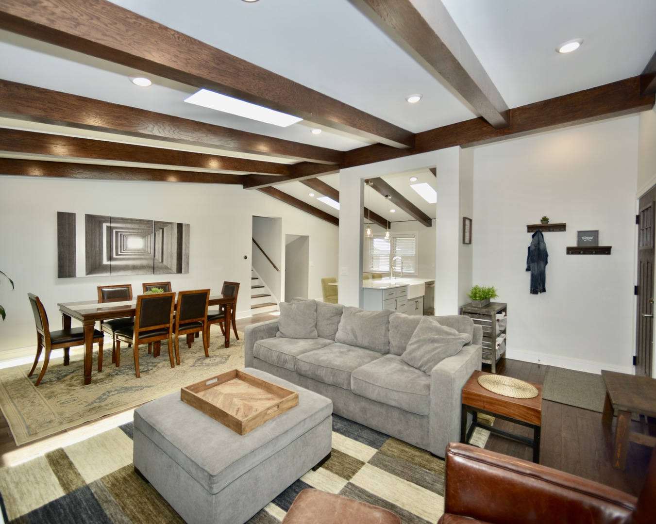 1181 Sherwood Road Highland Park, IL 60035 - Photo 6 of 22 a living room with furniture and a chandelier