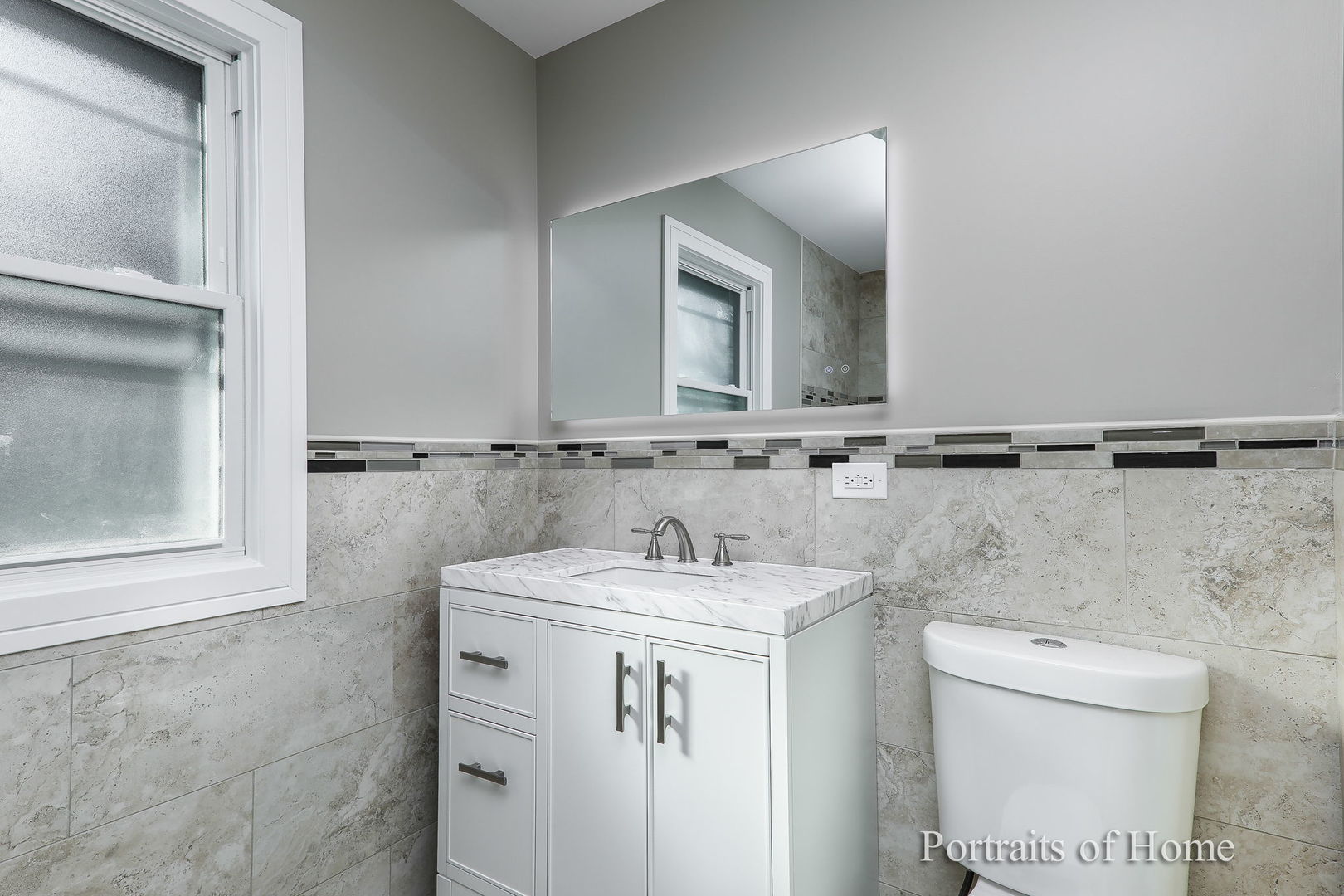 1181 Sherwood Road Highland Park, IL 60035 - Photo 9 of 22 a bathroom with a sink and a toilet