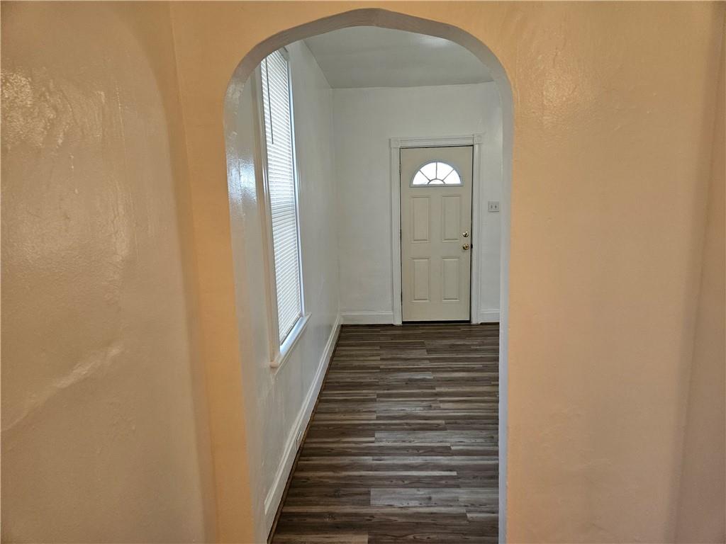 2212 Cronemeyer Street McKeesport, PA 15132 - Photo 16 of 48 a view of a hallway with wooden floor
