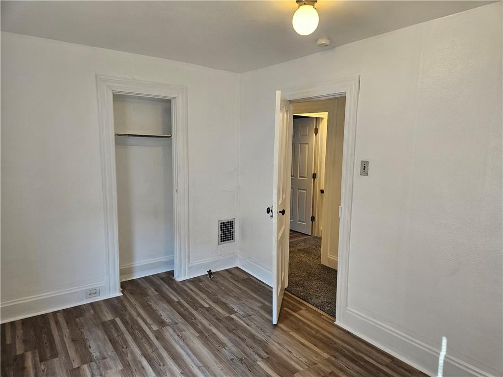 2212 Cronemeyer Street McKeesport, PA 15132 - Photo 30 of 48 wooden floor in an empty room