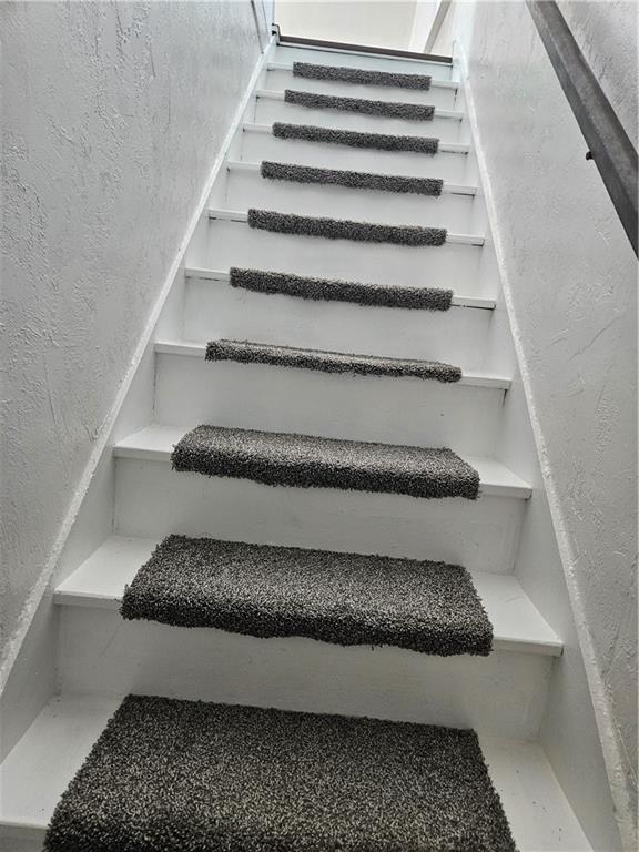 2212 Cronemeyer Street McKeesport, PA 15132 - Photo 44 of 48 a living room with a balcony furniture and stairs