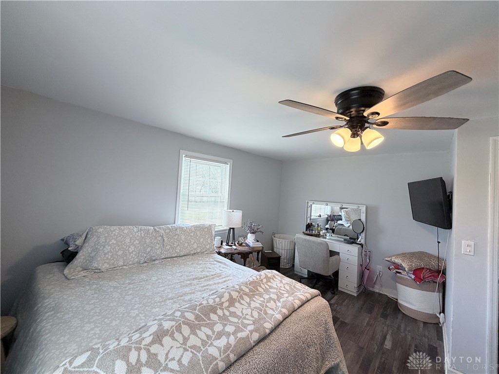 6800 Farmington Road Miamisburg, OH 45342 - Photo 22 of 32 This tranquil bedroom features durable flooring and a window with natural light.