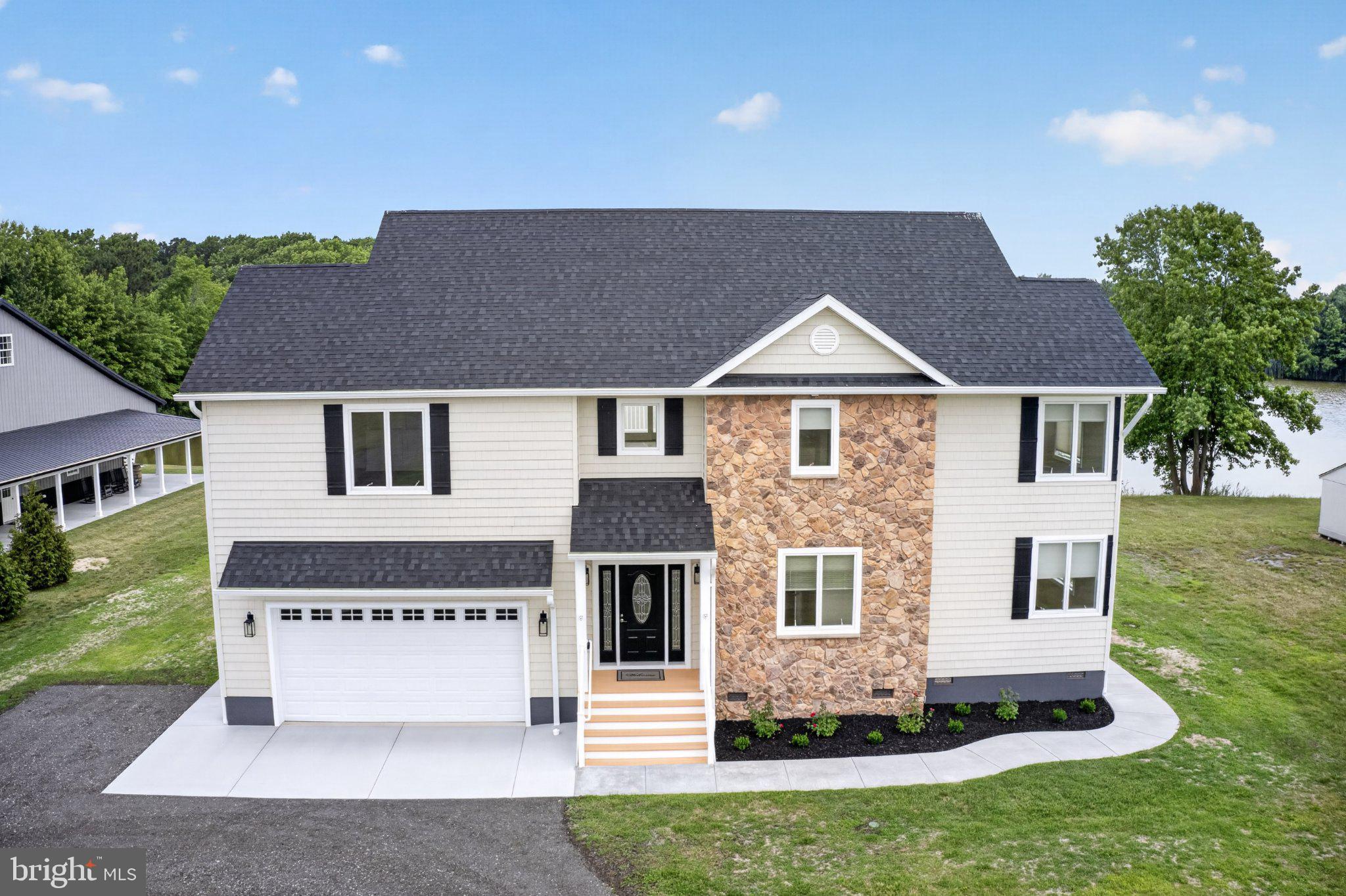 34029 Peppers Corner Road Millville, DE 19967 - Photo 6 of 101 Modern home with charming stone accents.