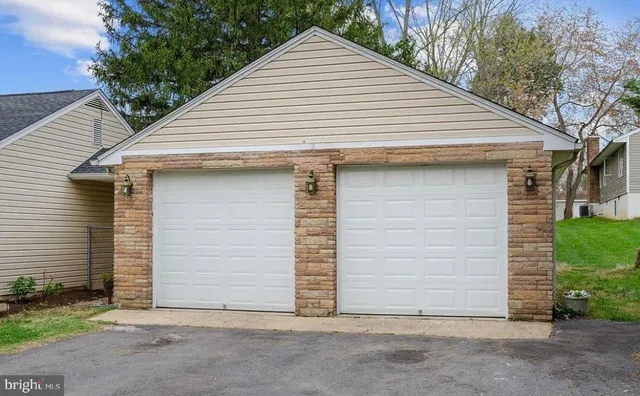 a view of small white house