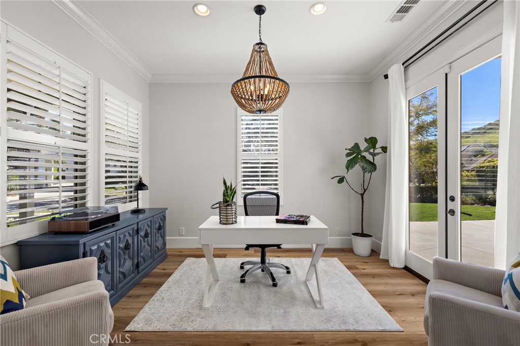 21 Snow Bush Street Ladera Ranch, CA 92694 - Photo 11 of 73 a living room with furniture and a large window