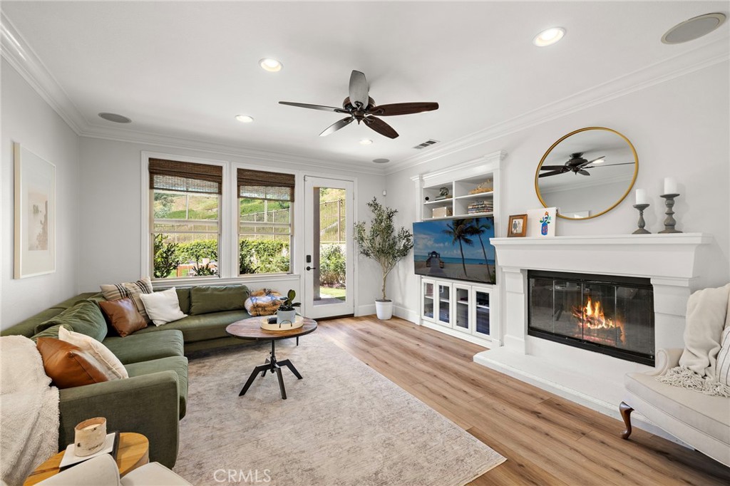 21 Snow Bush Street Ladera Ranch, CA 92694 - Photo 18 of 73 a living room with furniture fireplace and window