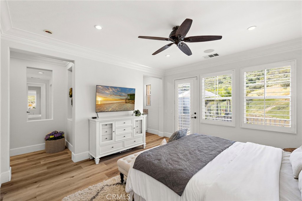 21 Snow Bush Street Ladera Ranch, CA 92694 - Photo 23 of 73 a bedroom with a bed and a flat screen tv