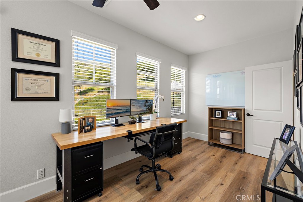 21 Snow Bush Street Ladera Ranch, CA 92694 - Photo 28 of 73 a view of a workspace with furniture and a window