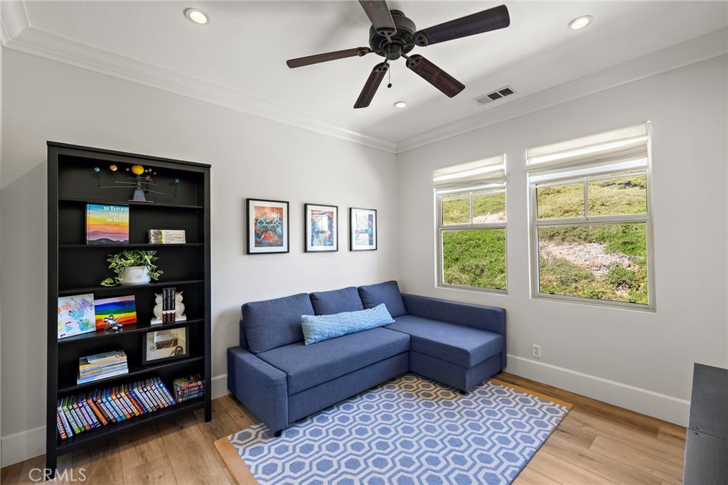21 Snow Bush Street Ladera Ranch, CA 92694 - Photo 30 of 73 a living room with furniture and a window