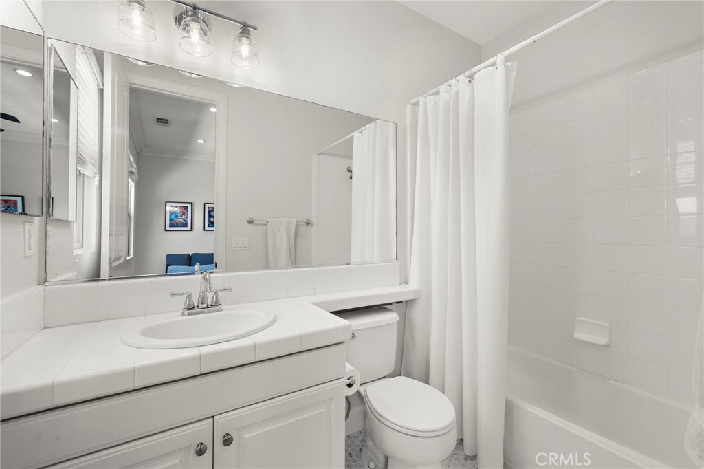 21 Snow Bush Street Ladera Ranch, CA 92694 - Photo 31 of 73 a bathroom with a sink toilet and shower