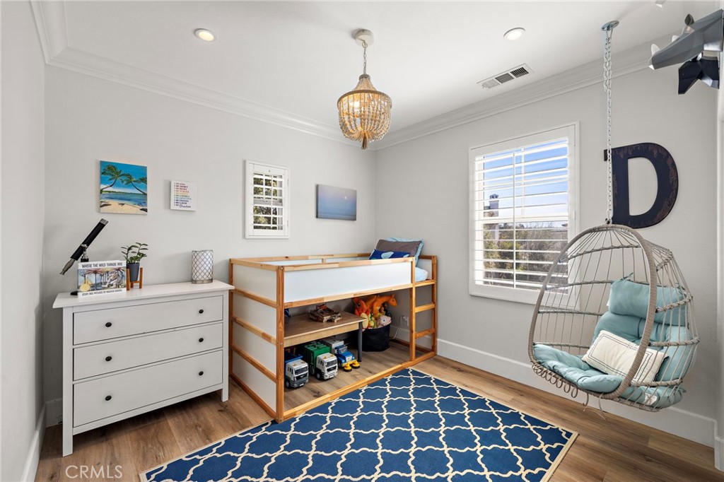 21 Snow Bush Street Ladera Ranch, CA 92694 - Photo 35 of 73 a view of room with furniture and a window