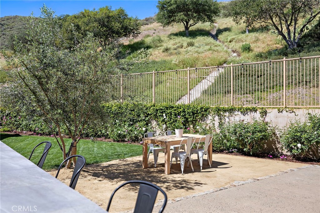 21 Snow Bush Street Ladera Ranch, CA 92694 - Photo 41 of 73 a view of a chairs and table in the patio