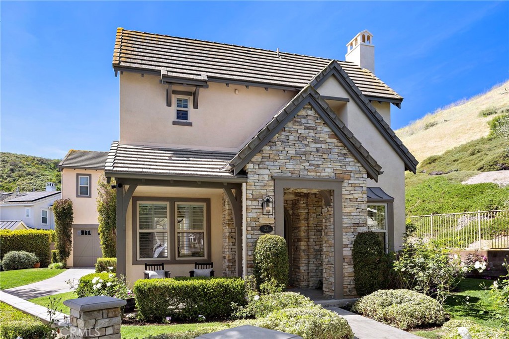 21 Snow Bush Street Ladera Ranch, CA 92694 - Photo 51 of 73 a view of a house with a yard