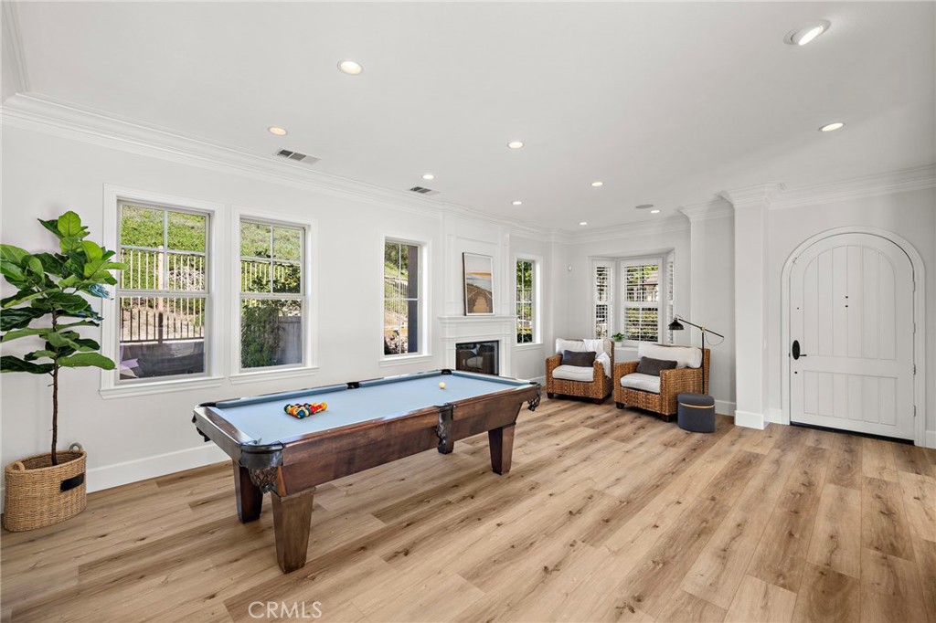 21 Snow Bush Street Ladera Ranch, CA 92694 - Photo 8 of 73 a living room with furniture and wooden floor