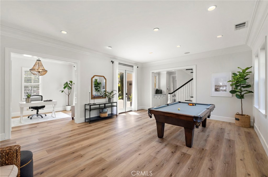 21 Snow Bush Street Ladera Ranch, CA 92694 - Photo 10 of 73 a living room with furniture a wooden floor and next to a window
