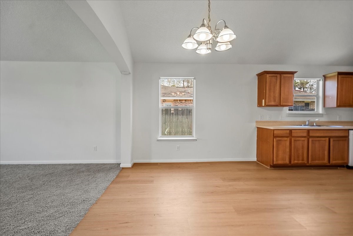 726 Flying Bridge Way Crosby, TX 77532 - Photo 13 of 32 a view of a kitchen with a sink cabinets and a window