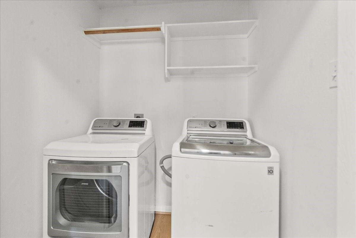 726 Flying Bridge Way Crosby, TX 77532 - Photo 26 of 32 a utility room with dryer and washer