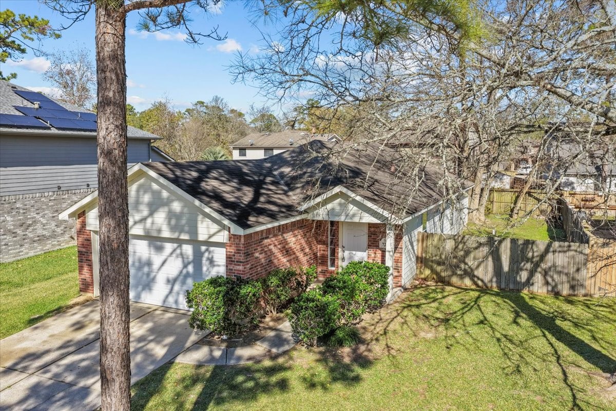 726 Flying Bridge Way Crosby, TX 77532 - Photo 3 of 32 a view of a house with a tree in front of it