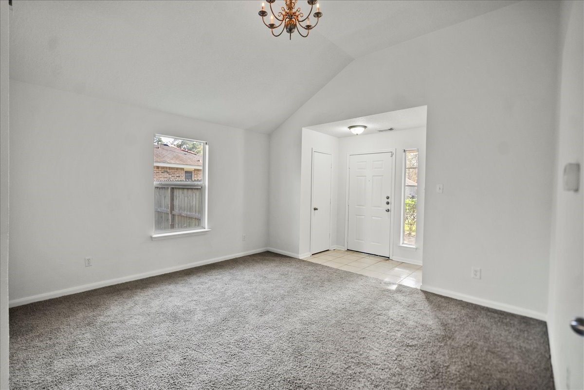 726 Flying Bridge Way Crosby, TX 77532 - Photo 7 of 32 an empty room with windows and closet