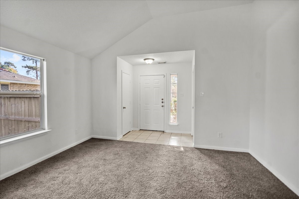 726 Flying Bridge Way Crosby, TX 77532 - Photo 8 of 32 a view of an empty room with window