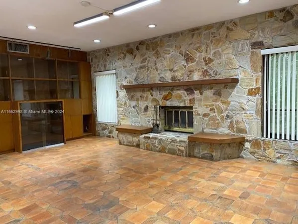 a view of a fireplace in the room