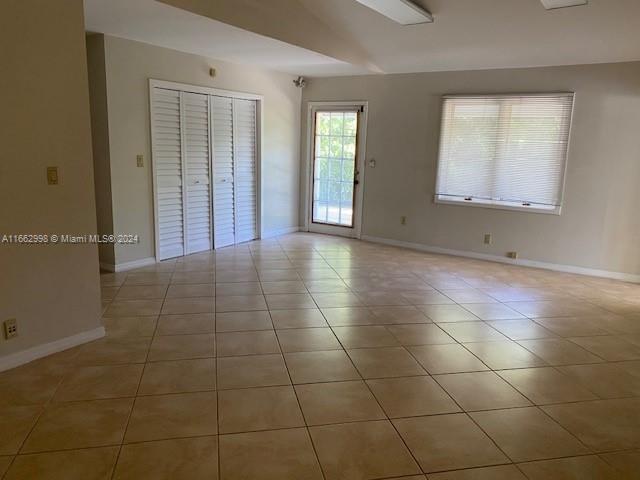4450 Jog Road Lake Worth, FL 33467 - Photo 10 of 18 a view of an empty room with a window