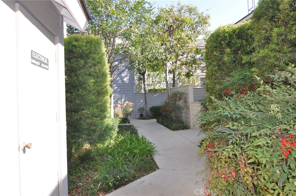 249 Alpine Street, Unit 48 Pasadena, CA 91106 - Photo 12 of 14 a aerial view of a house with a yard and garden