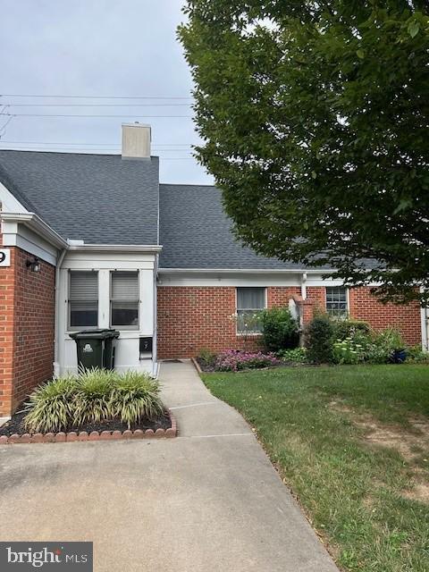 9 East Village Road, Unit 9 Newark, DE 19713 - Photo 2 of 14 front view of a house with a yard