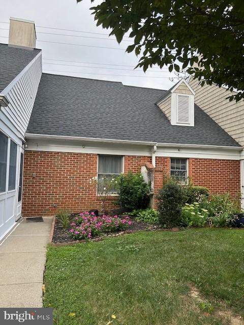 9 East Village Road, Unit 9 Newark, DE 19713 - Photo 3 of 14 a front view of a house with a garden