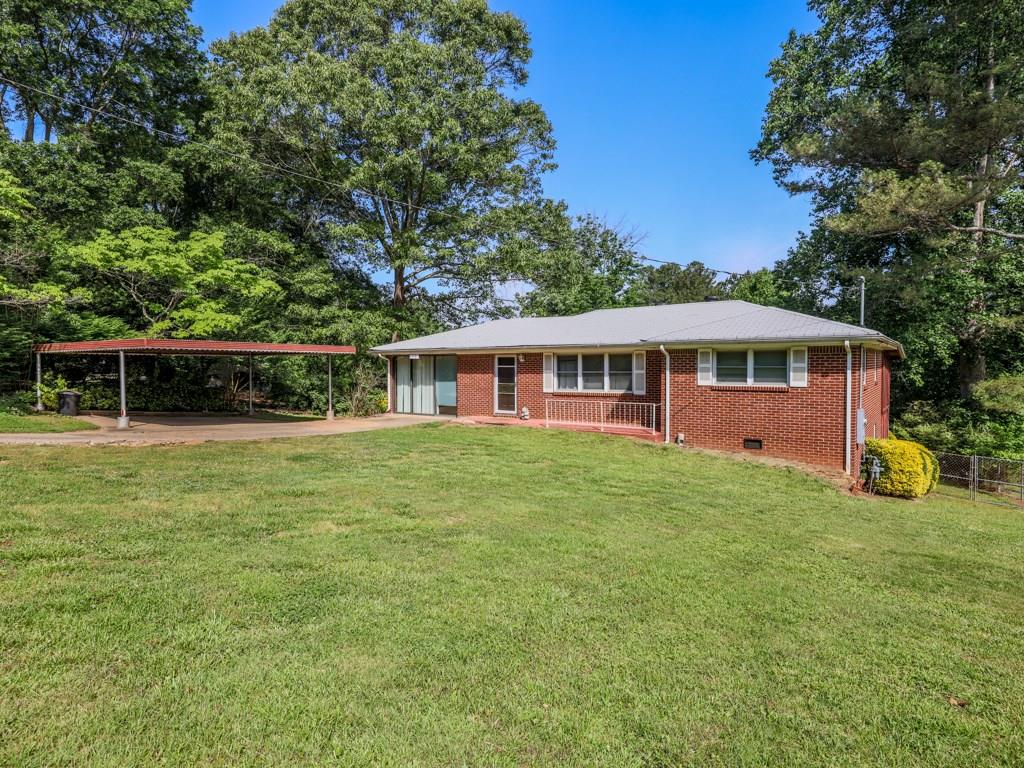 119 Cooper Lake Road Southeast Mableton, GA 30126 - Photo 1 of 1 Well built 4 sided brick home and carport