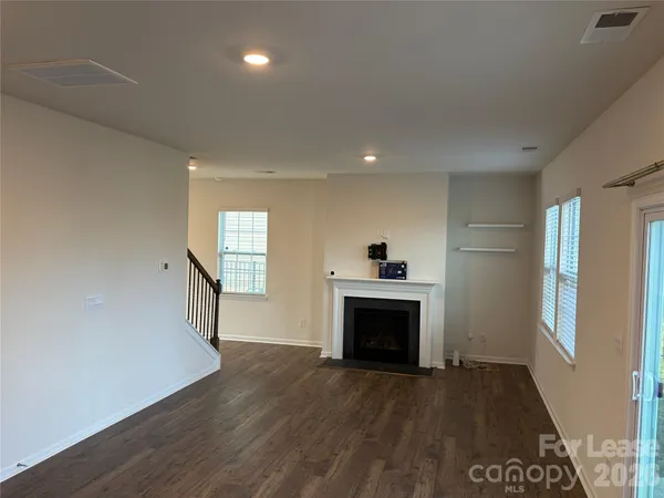 a bath room with a toilet and a bath tub