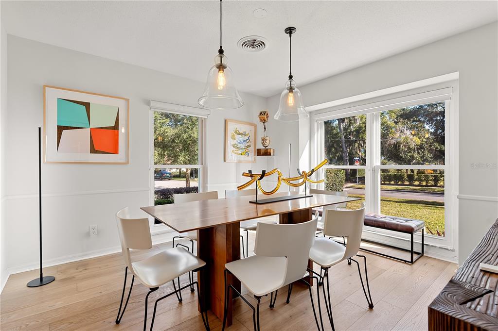 850 Juanita Rael Road Winter Park, FL 32789 - Photo 17 of 50 a view of a dining room with furniture window and outside view