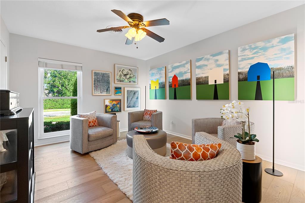 850 Juanita Rael Road Winter Park, FL 32789 - Photo 24 of 50 a living room with furniture and a flat screen tv
