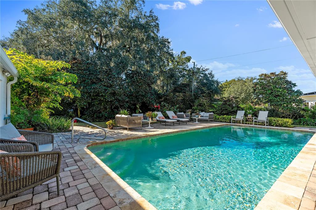 850 Juanita Rael Road Winter Park, FL 32789 - Photo 33 of 50 a view of a swimming pool with a patio