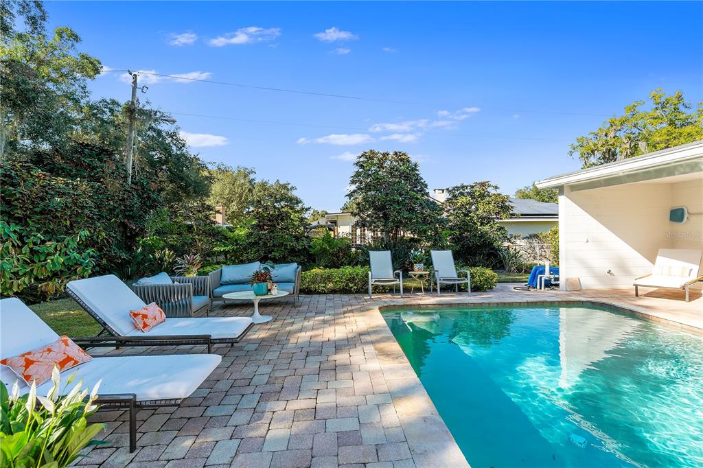 850 Juanita Rael Road Winter Park, FL 32789 - Photo 36 of 50 a view of a backyard with sitting area