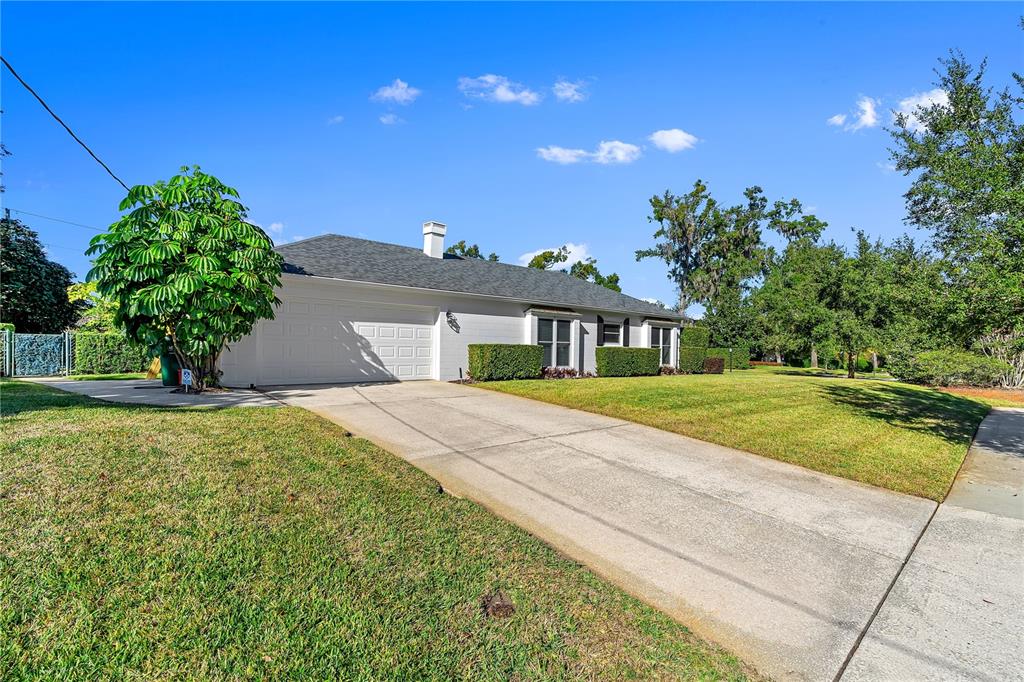 850 Juanita Rael Road Winter Park, FL 32789 - Photo 39 of 50 a front view of a house with yard