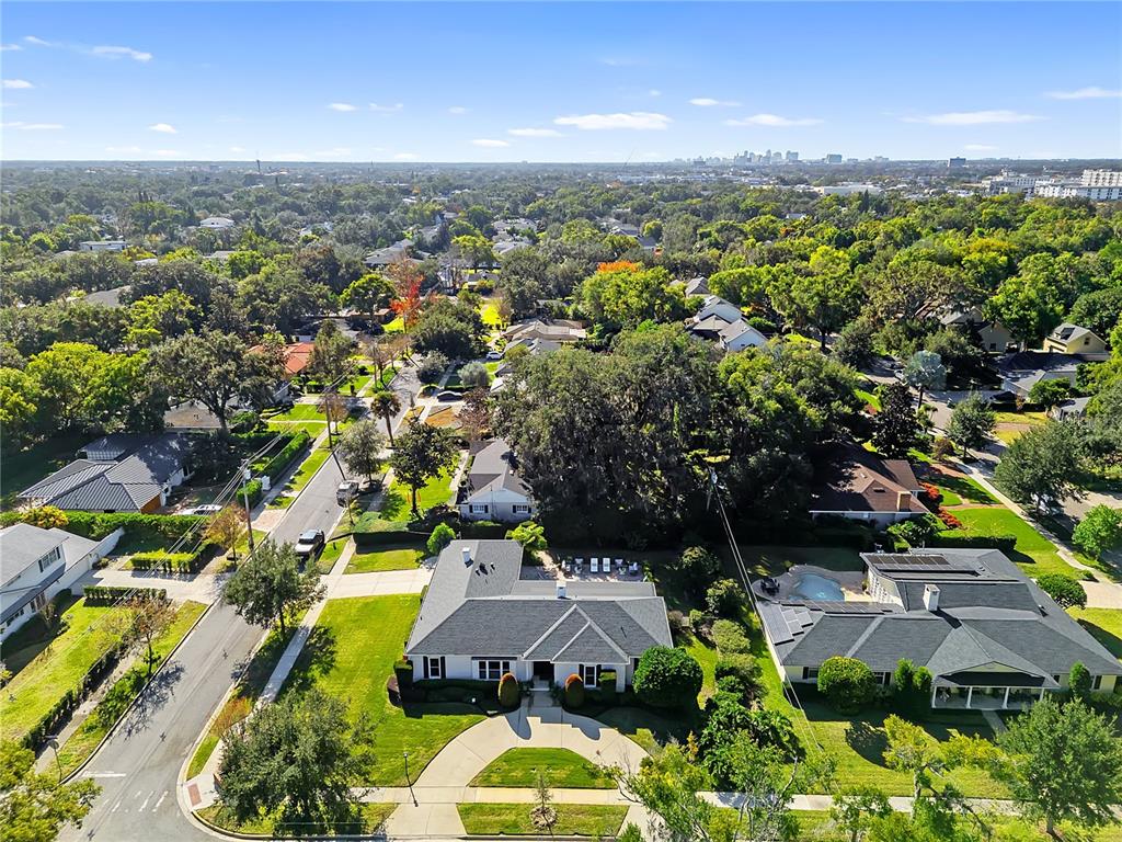 850 Juanita Rael Road Winter Park, FL 32789 - Photo 42 of 50 an aerial view of a house with a yard