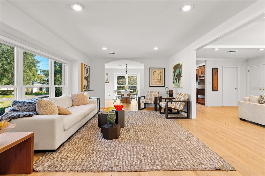 850 Juanita Rael Road Winter Park, FL 32789 - Photo 5 of 50 a living room with furniture and large windows