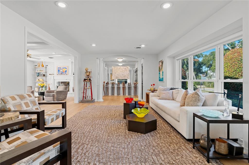 850 Juanita Rael Road Winter Park, FL 32789 - Photo 7 of 50 a living room with furniture and a wooden floor
