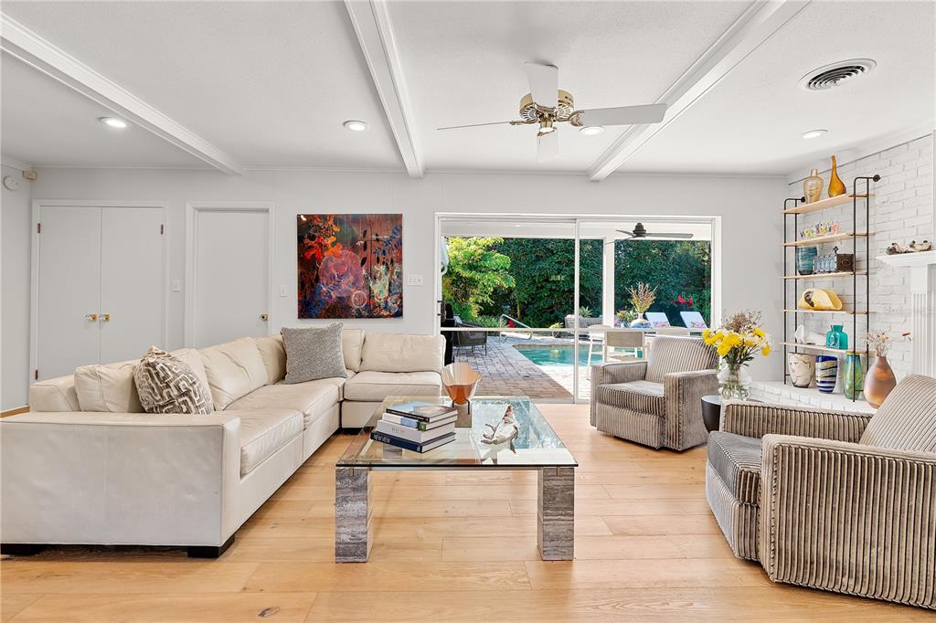 850 Juanita Rael Road Winter Park, FL 32789 - Photo 8 of 50 a living room with furniture and a large window