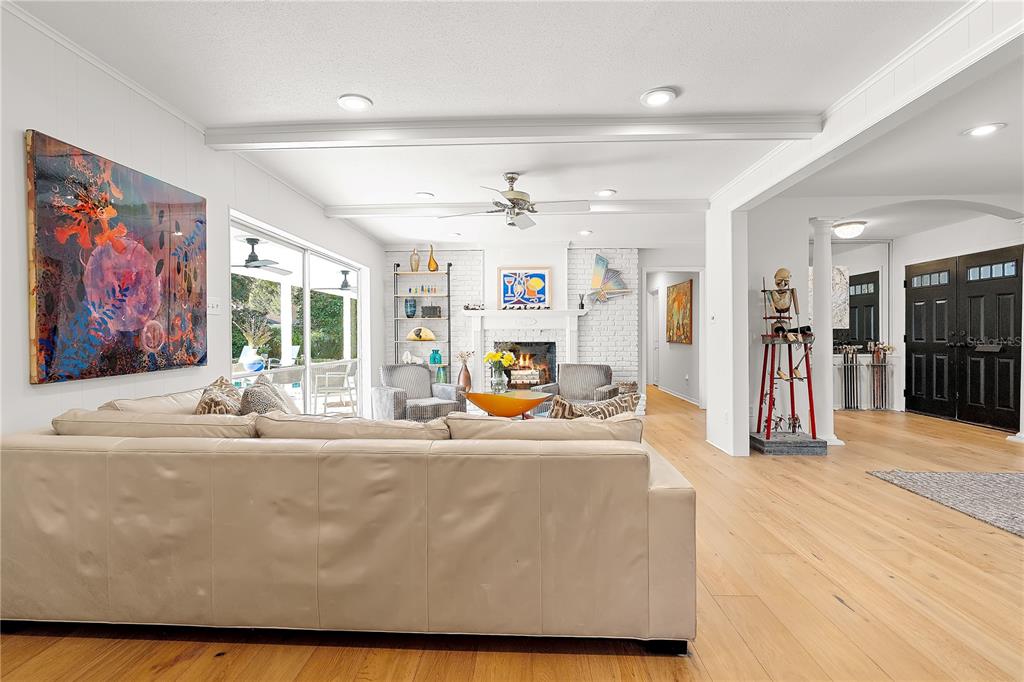 850 Juanita Rael Road Winter Park, FL 32789 - Photo 10 of 50 a living room with furniture and a large window