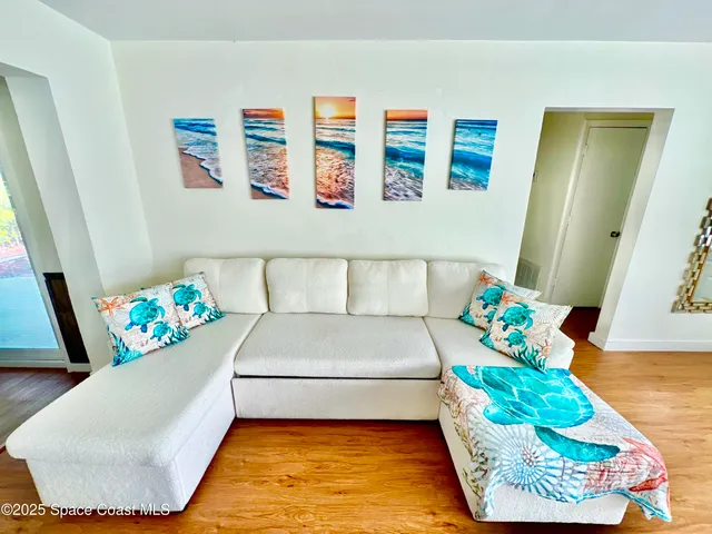 a living room with a couch and a couch