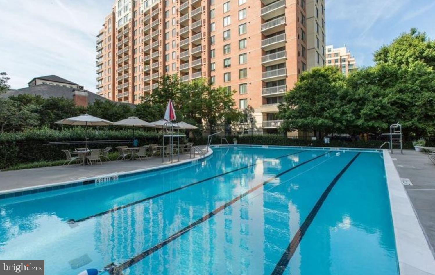 11710 Old Georgetown Road, Unit 422 North Bethesda, MD 20852 - Photo 24 of 29 a view of a swimming pool with a garden